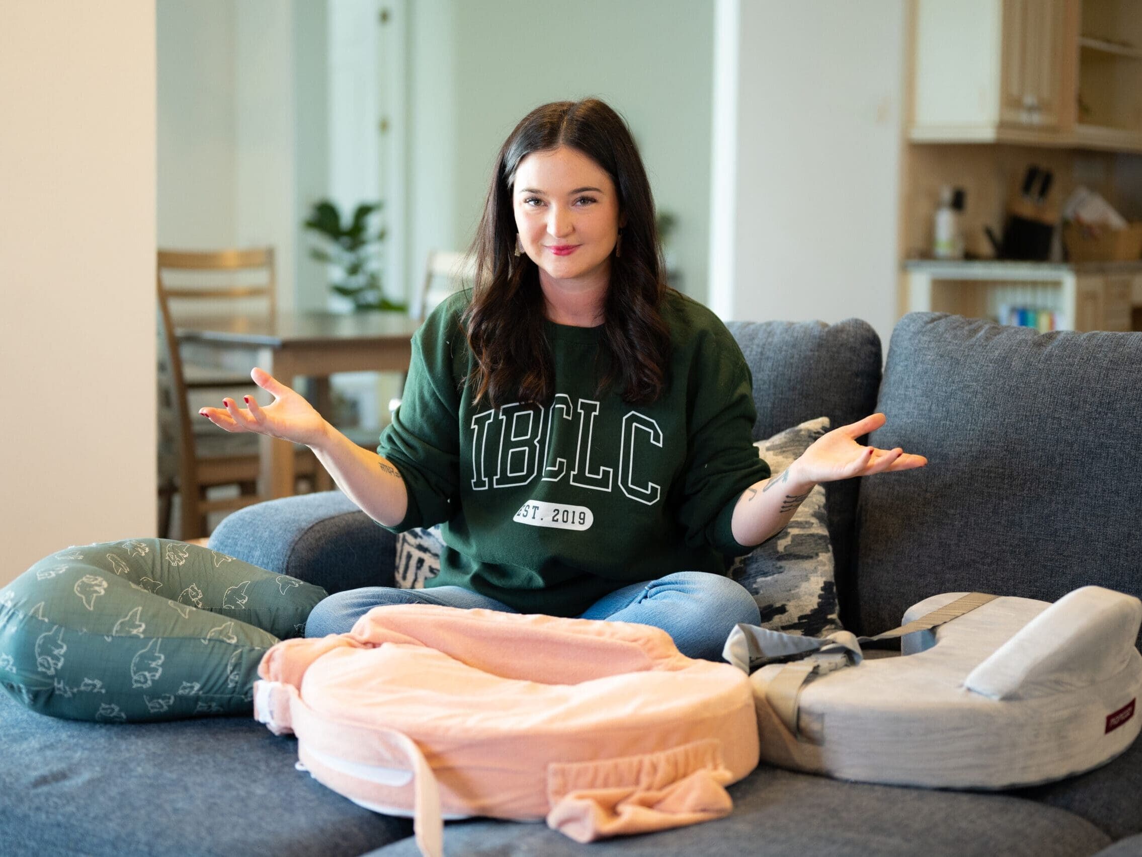 IBCLC and owner of The Latch Link showing the best nursing pillows